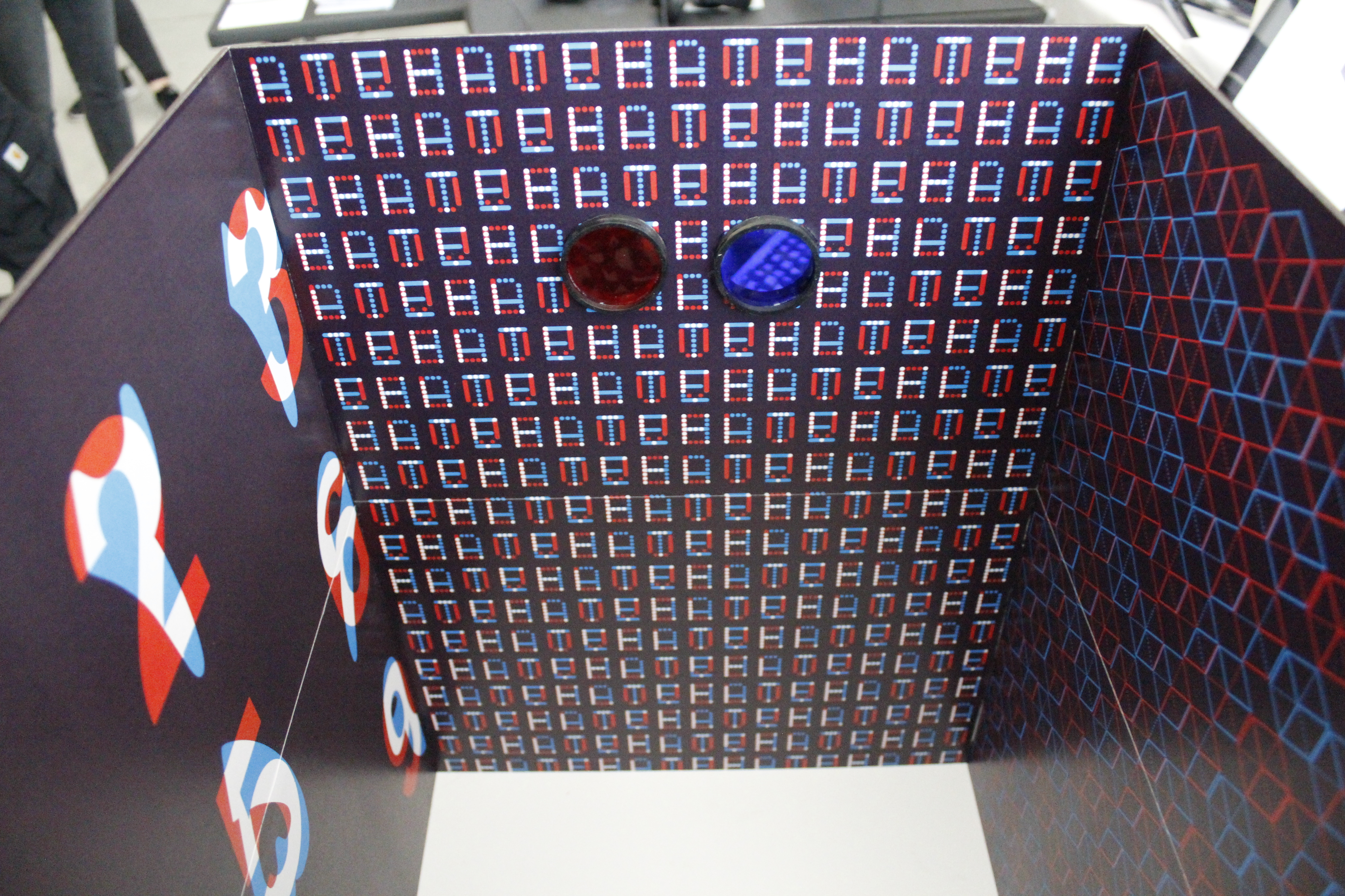 View into a Box with Blue and Red printing on the inside.